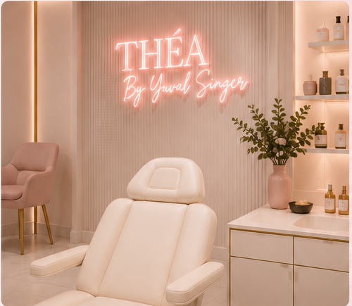 Treatment room with THÉA sign